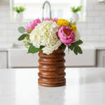 Orvani Petite Spoon Stand is a statement piece that blends artisanal woodworking with practical kitchen utility.