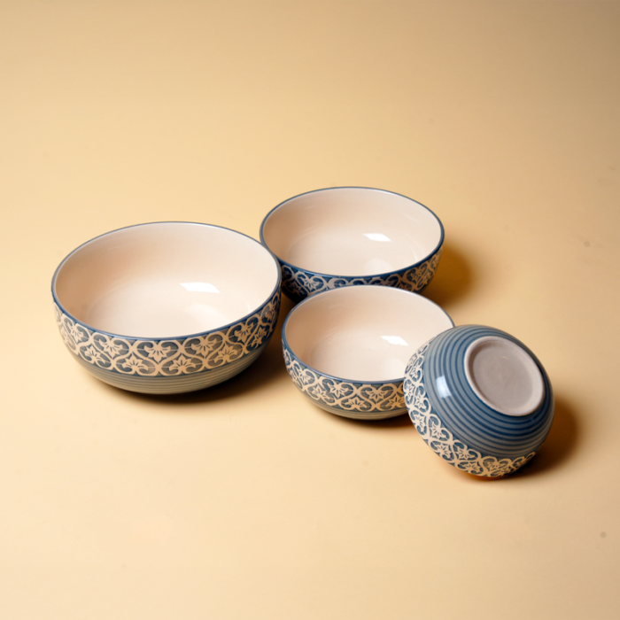 Modern grey ceramic bowls for soups and salads on a styled dining table