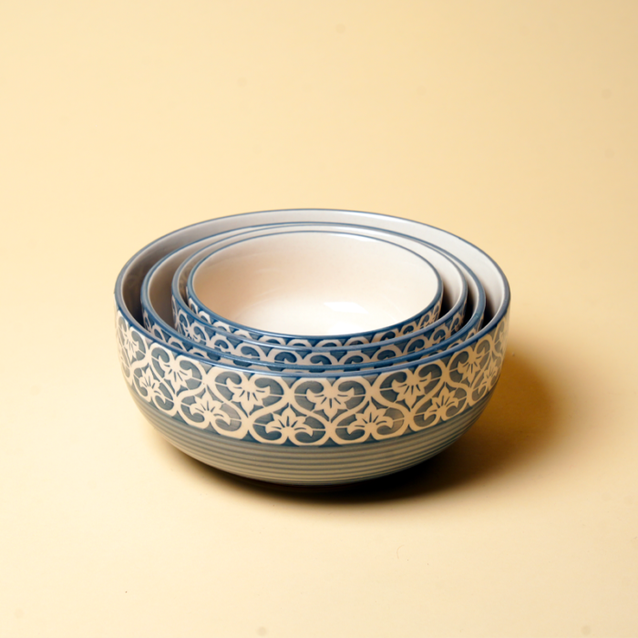 Modern grey ceramic bowls for soups and salads on a styled dining table