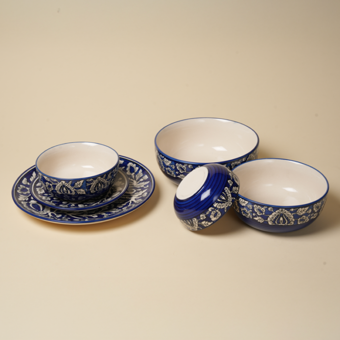 Hand-painted midnight blue floral ceramic dining plates and bowls