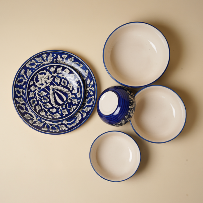 Hand-painted midnight blue floral ceramic dining plates and bowls