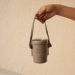 Slate Wander insulated coffee cup with spill-proof lid and straw opening