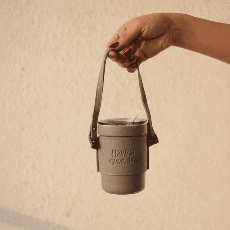 Slate Wander insulated coffee cup with spill-proof lid and straw opening