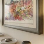 Black and white vintage European courtyard facade wall art in a wooden frame