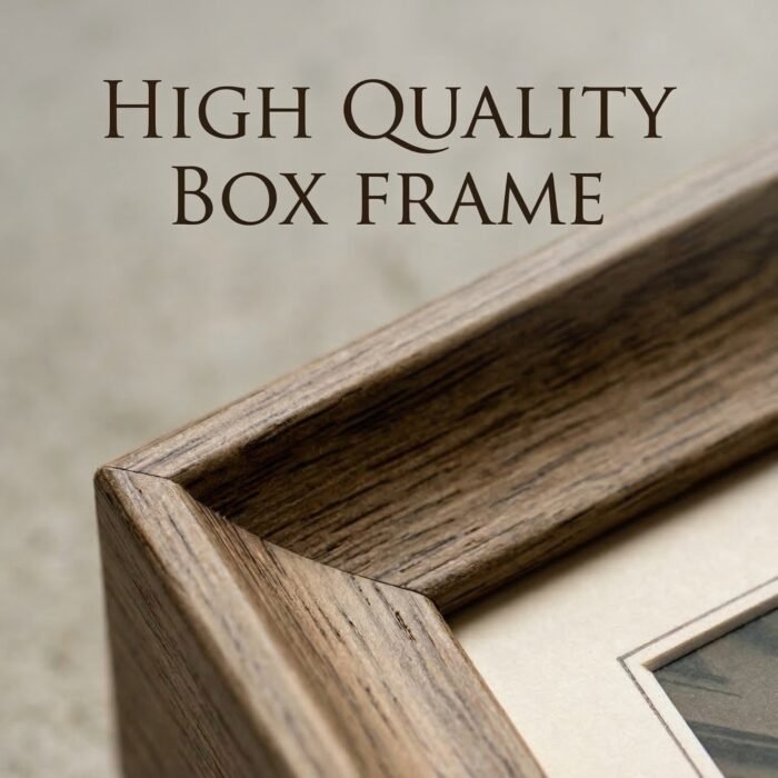 Black and white vintage European building facade wall art in a wooden frame